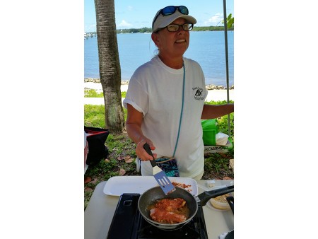 April Price cooking up Lionfish for all to sample